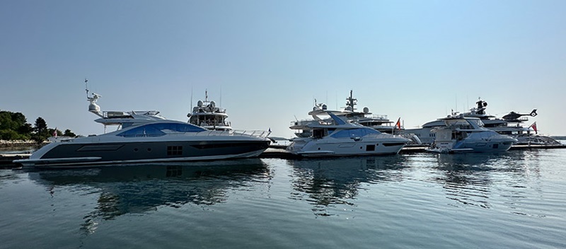 Three Azimut yachts on the water