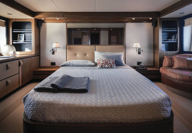 luxurious master bedroom of interior cabin of yacht