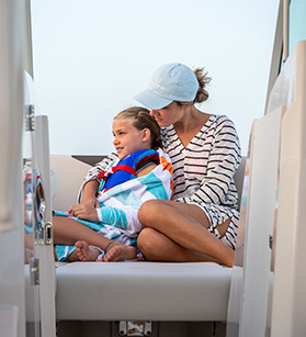 Mom with a daughter onboard of a Sailfish boat