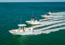 multiple boston whaler boats on the water