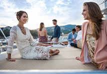 two couples at the bow of an azimut