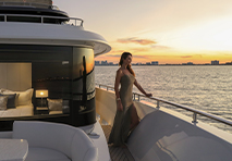 women on a yacht looking out