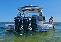 3 engines on the back of a cruiser yacht