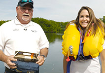 a man and woman on a boat