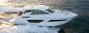 White and black cantius model in the water with people on board