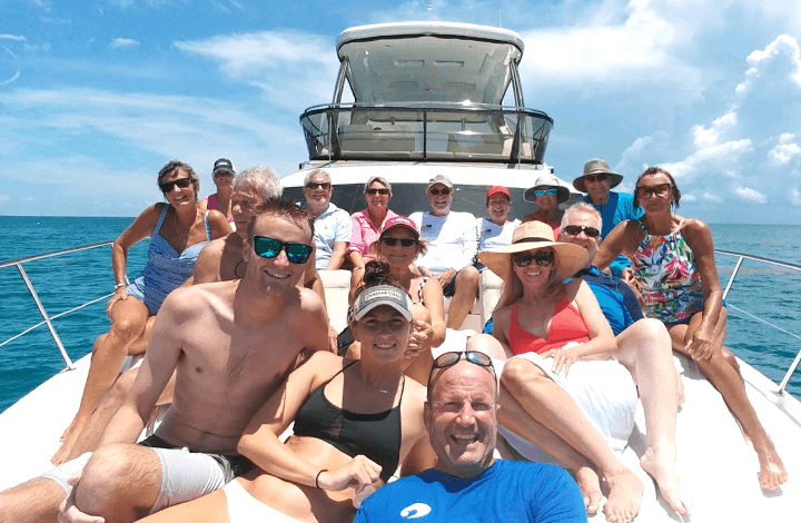 group of people on a boat for getaways trip