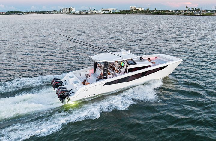 aquila 28 molokai power catamaran on the water