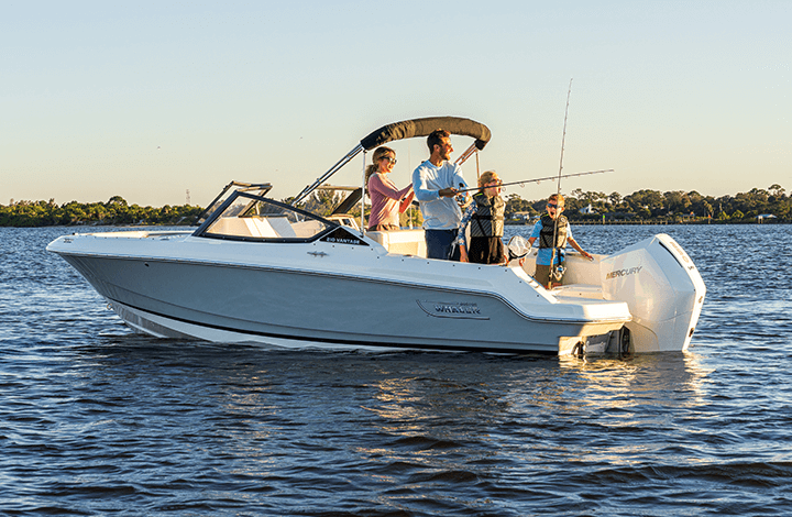 family fishing on a boat