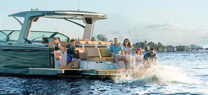 family on an Aviara boat