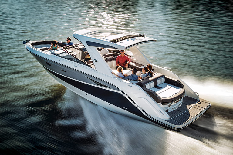 Friends enjoying their time on a Sport Boat