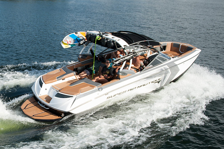 Wakeboard cruising through blue ocean.