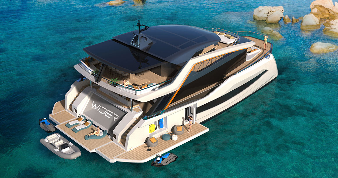 Wider Yachts Cat 92 in the water with rocks near