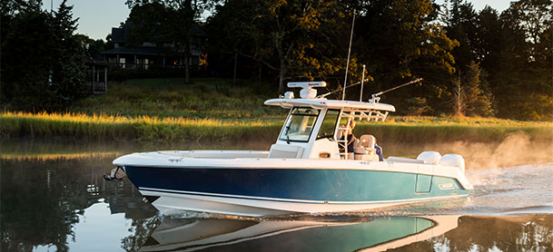 Boston Whaler 330 Outrage calmly driving