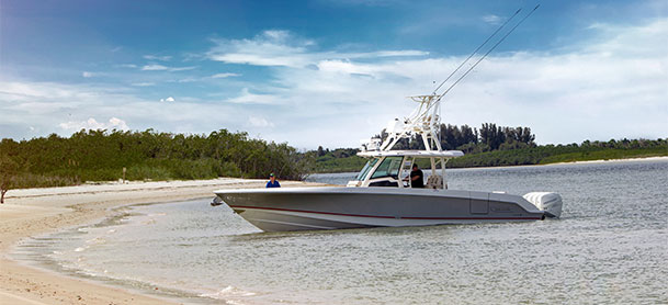 Boston Whaler 380 Outrage by shoreline