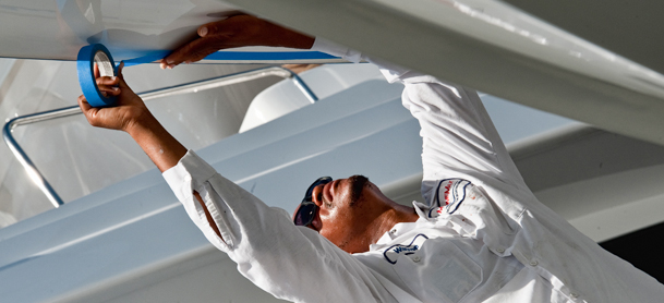 Man cleaning his boat