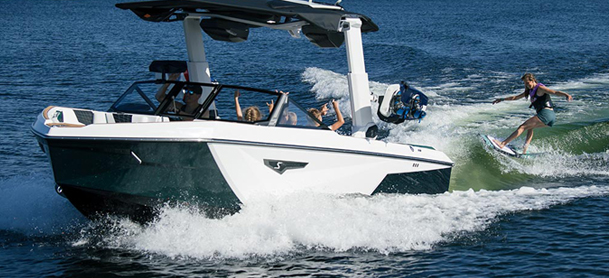 Photo of a person wakesurfing from a Super Air Nautique