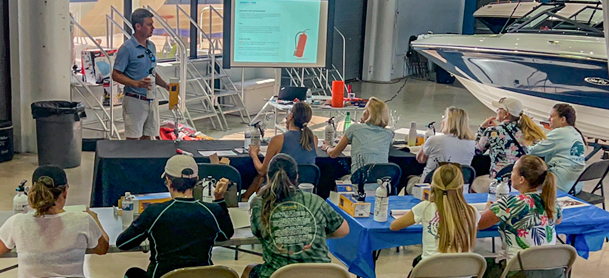 group of people at a class about boating