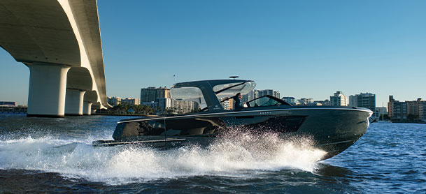 Aviara 40 on water with bridge and city skyline in the background 