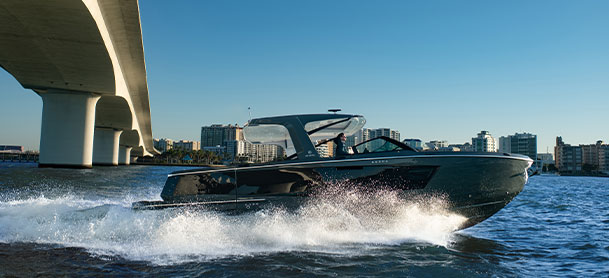 Aviara 40 on water with bridge and city skyline in the background