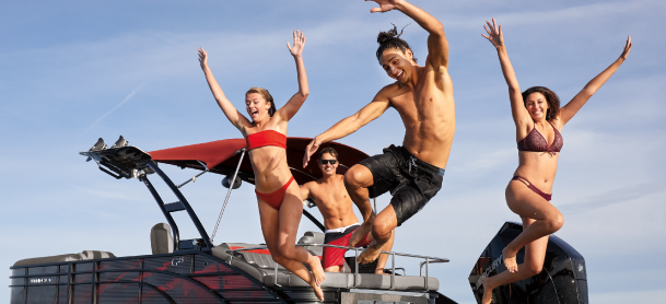 Group of friends having fun on Bennington Pontoon boat