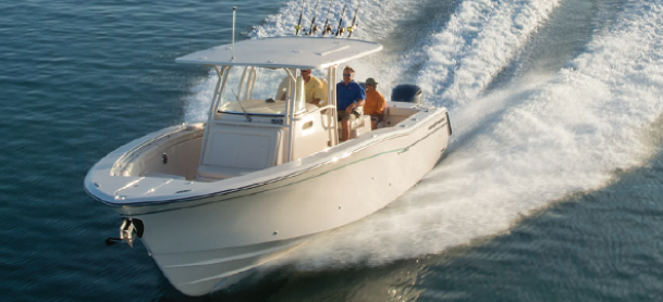 Boat running out on the water with people onboard