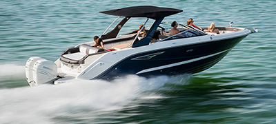 Family cruising on a MarineMax Sea Ray Sport Boat.