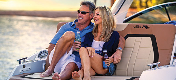 Couple on back of Sea Ray SLX 350