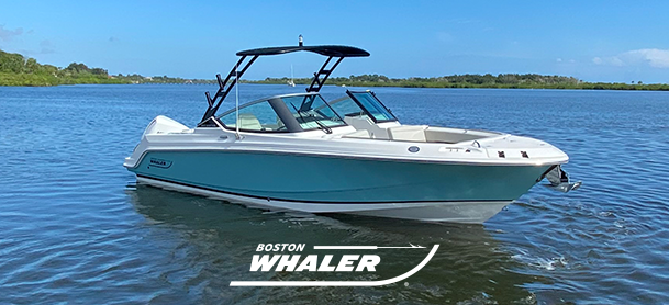 Boston Whaler blue and white model on the water 