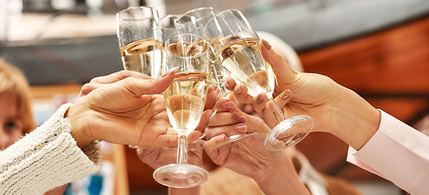 boaters toasting with wine glasses