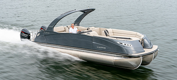 Harris Pontoon Crowne model driving on the water