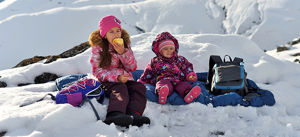 Kids having lunch at a ski resort