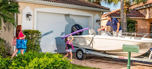 family getting their boat ready