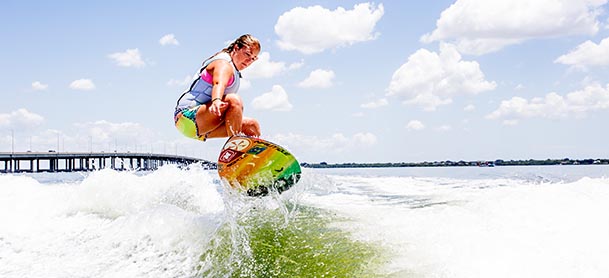 A girl wakesurfing