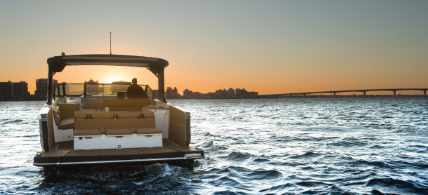Aviara AV40 boat out on the water with a sunset view