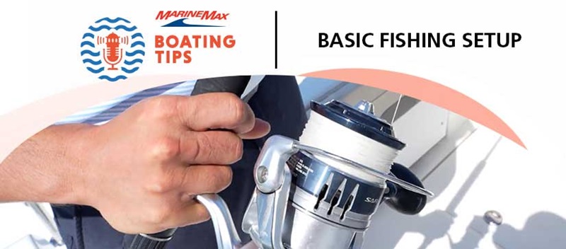 Hand holding a fishing reel with boating tips logo