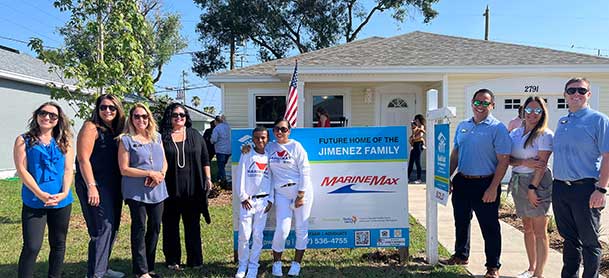 Jimenez Family at their home dedication with the MarineMax sign