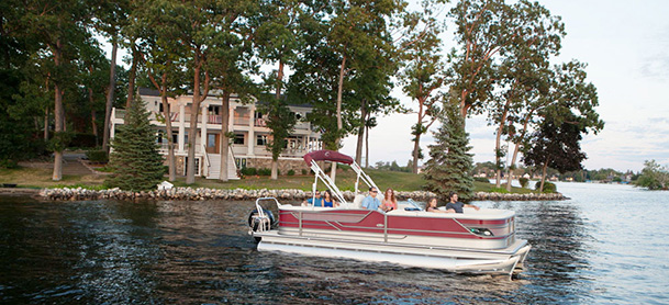 People aboard a pontoon in the water