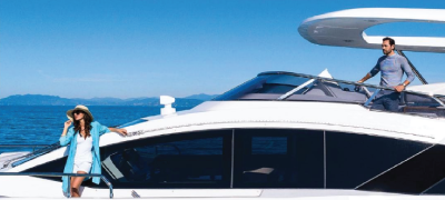 A woman on a yacht with a clear sky