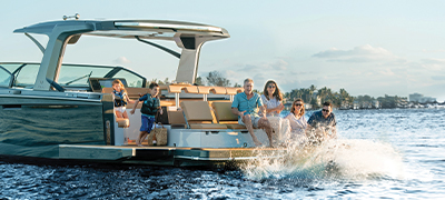 A family aboard an anchored boat