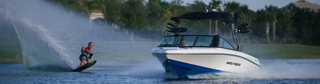 A Nautique boat with a water skier