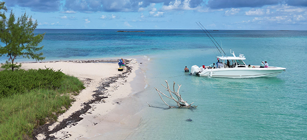 A boat floats gently on the water, surrounded by a calm and serene landscape.