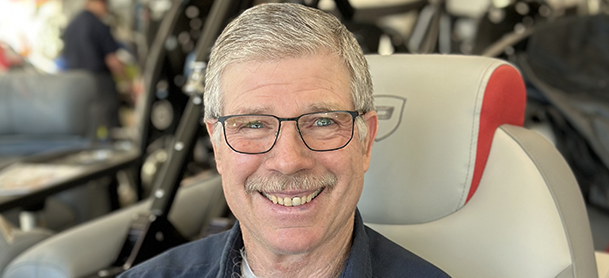 a marinemax service tech smiles for a picture