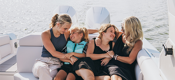 A family of boaters enjoying time on the water