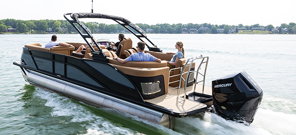 A pontoon cruising gently on the lake