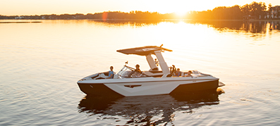 Boat in the water during sunset