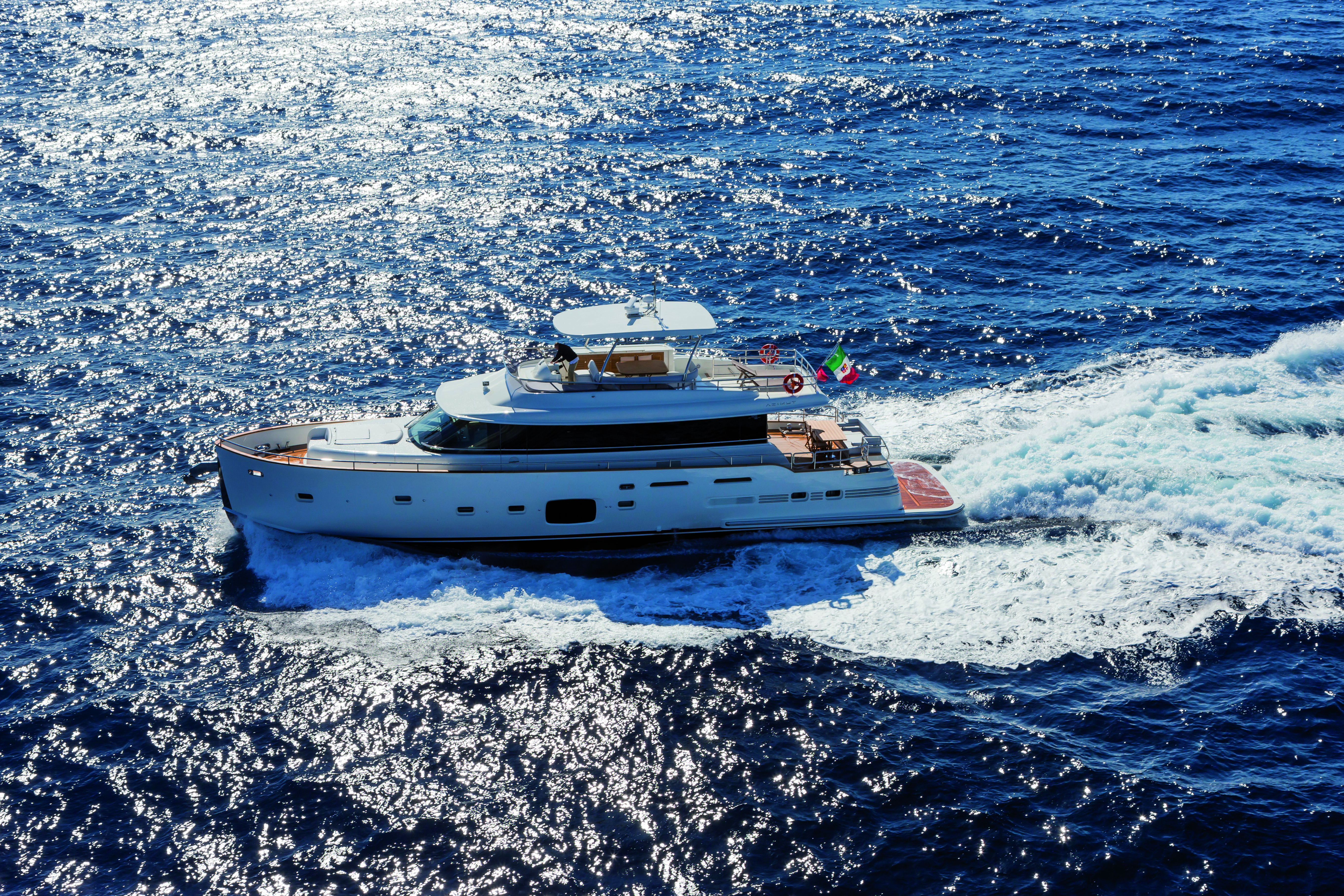 Azimut magellano trawler boat out at sea traveling to a destination