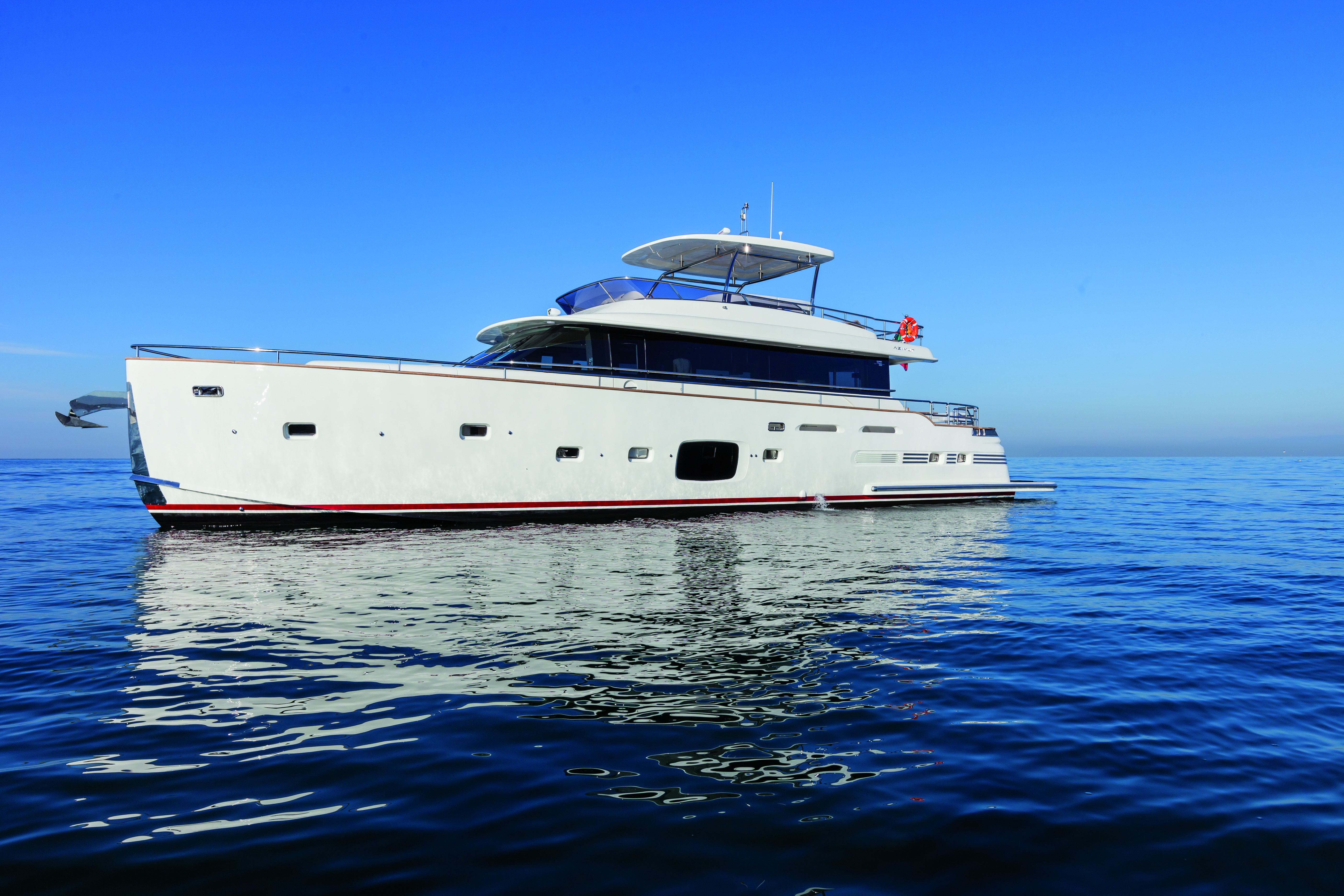 Azimut magellano trawler boat out at sea traveling to a destination
