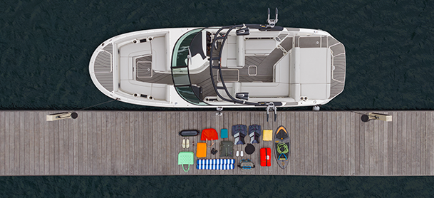 vertical view of a boat with materials at a dock