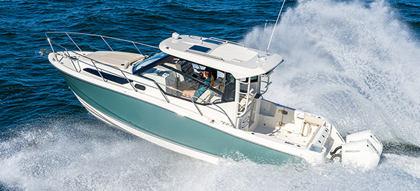 A boston whaler carving up the water