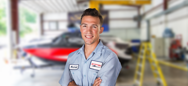 A MarineMax technician posing for the camera